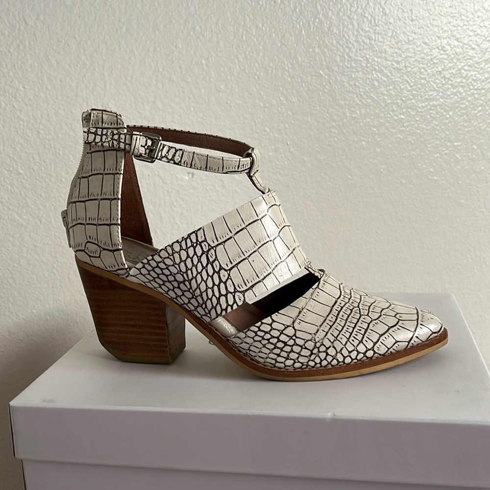 Cut out snakeskin ankle booties